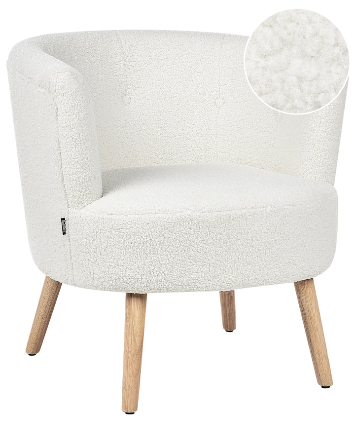 White textured armchair with wooden legs on a white background