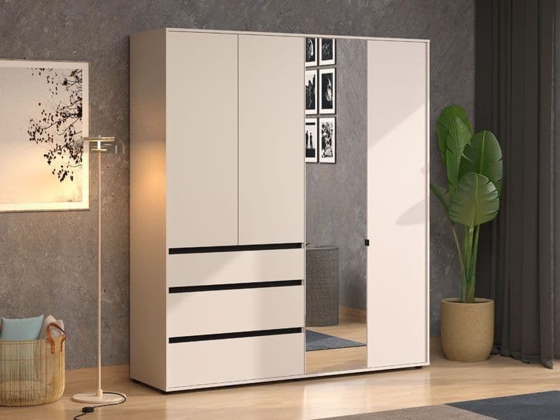 White wardrobe with mirror doors in a room with a plant and lamp.