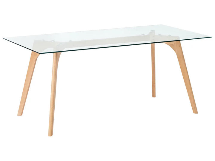 Glass dining table with wooden legs on a white background