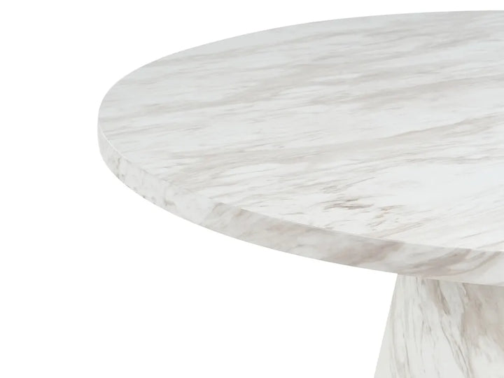 Round marble table with a white and gray marbled pattern on a white background