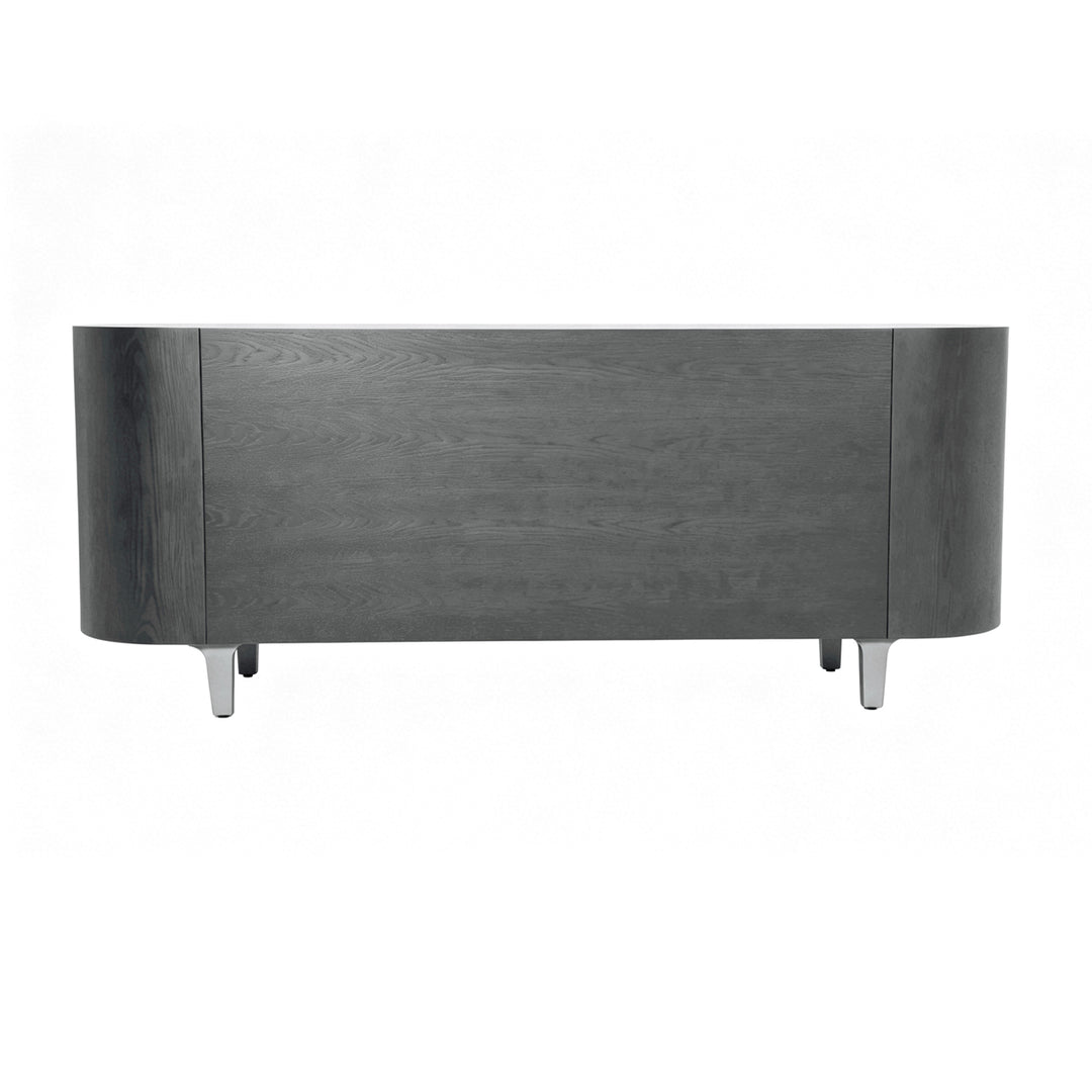 A modern curved sideboard or console table with a dark gray wood grain finish and slim metallic legs, shown against a plain white background.