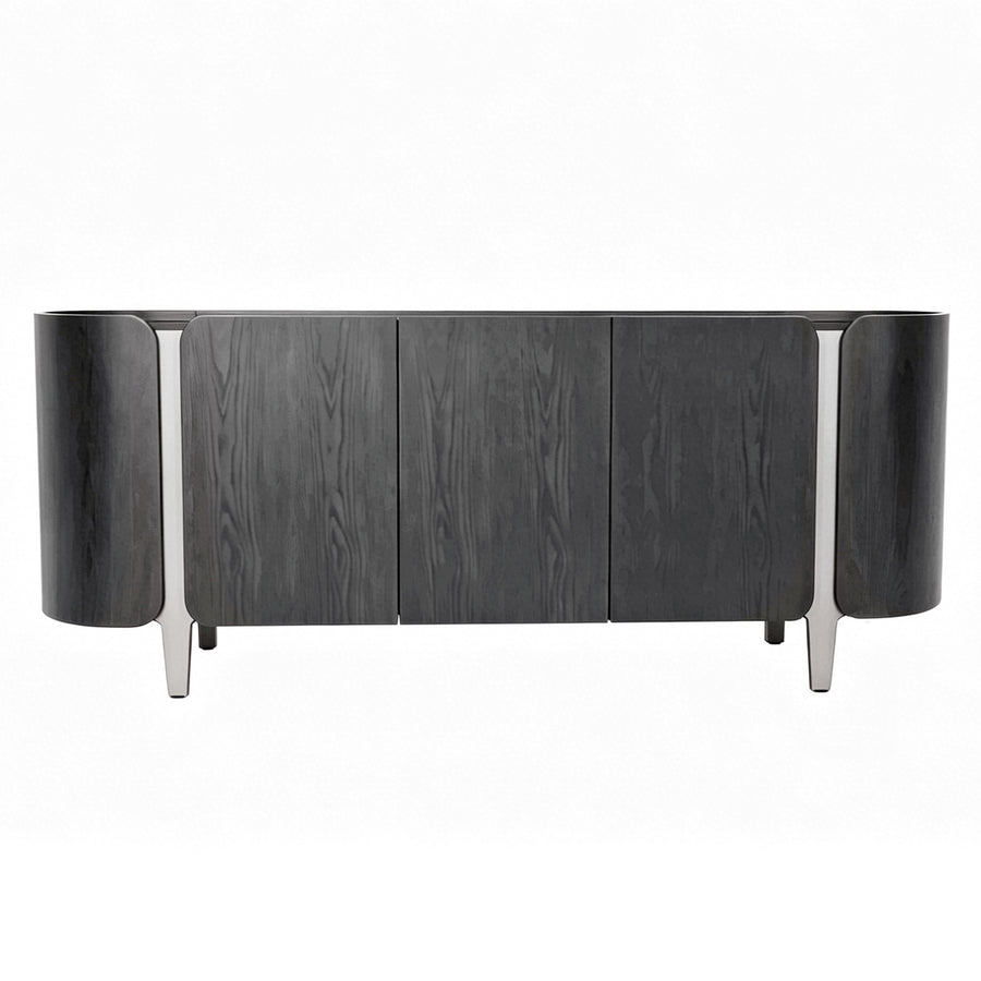 A modern sideboard or credenza with a dark gray wood grain finish, featuring curved cylindrical side panels and slim silver metal legs, shown against a plain white background.