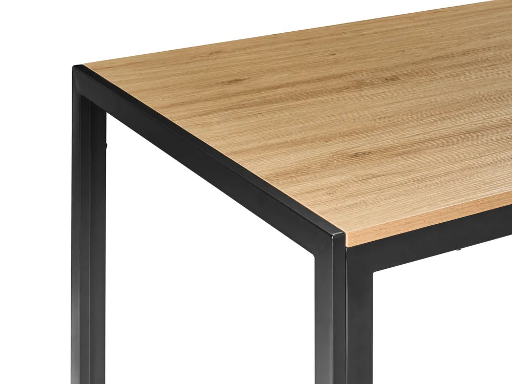 Wooden table with black metal legs on a white background