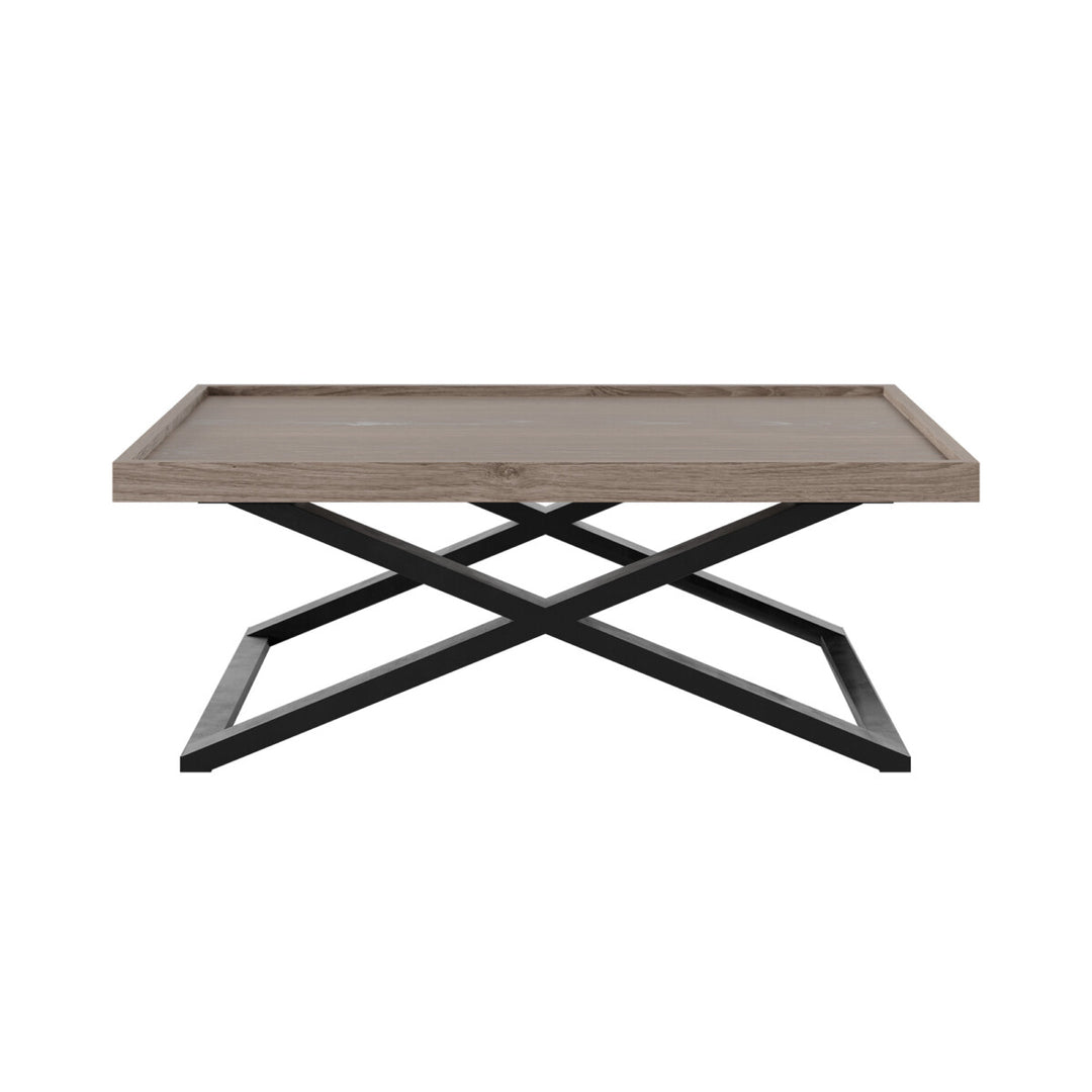 Coffee table with wooden top and black metal base on a white background