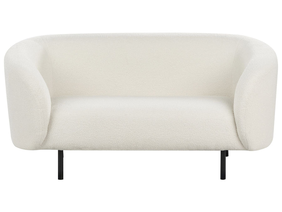 White sofa with black legs on a white background