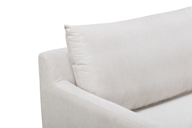 Light gray sofa with a pillow on a white background