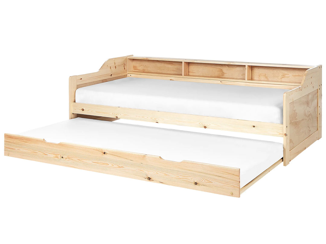Wooden bed frame with a white mattress on a white background
