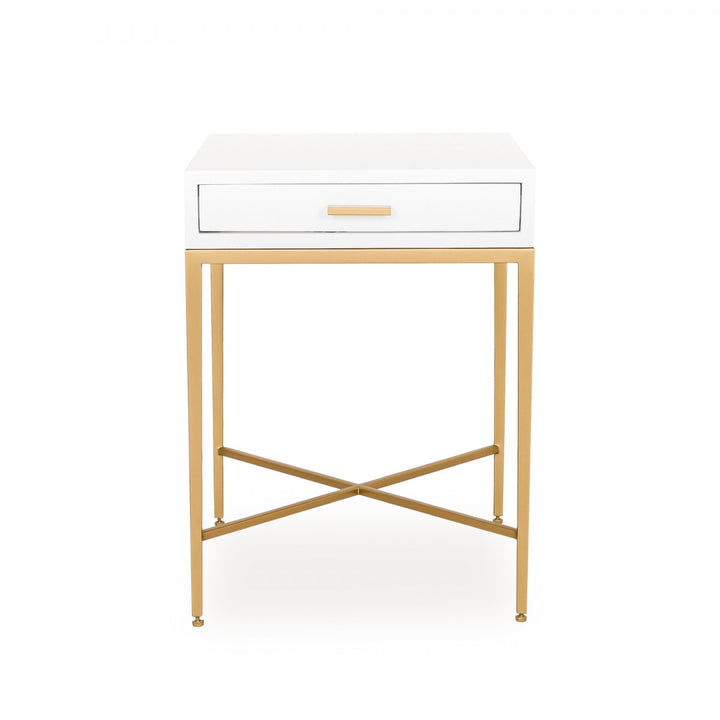 White side table with gold legs on a white background