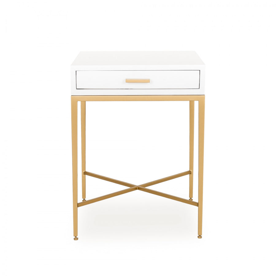 White side table with gold legs on a white background