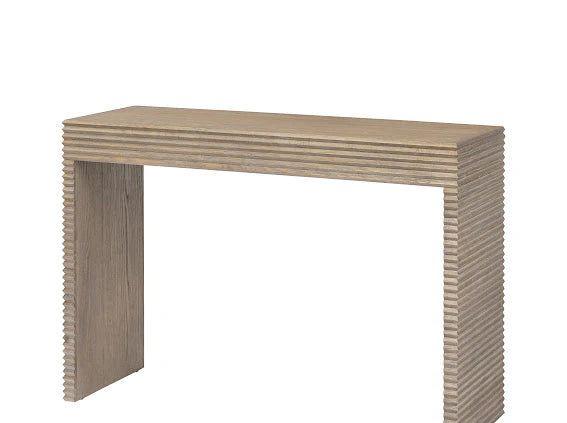 Wooden console table with a ribbed design on a white background