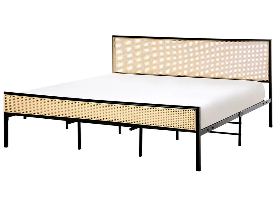 Bed with beige woven sides and headboard on a white background
