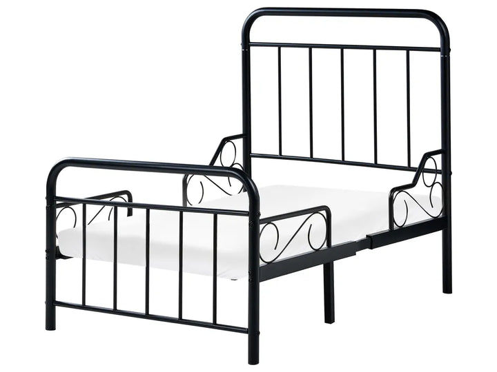 Black metal bed frame on a white background