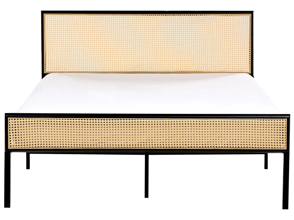 Bed with woven headboard and frame on a white background