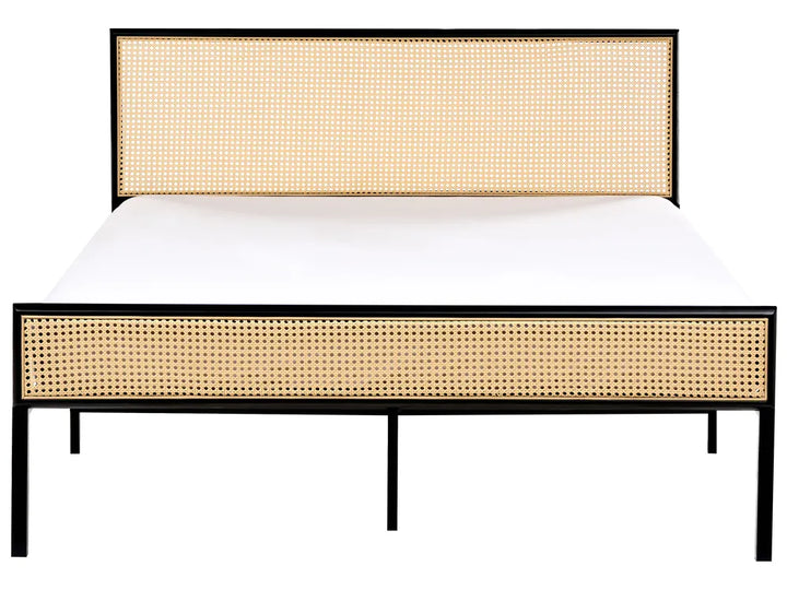 Bed with woven headboard and frame on a white background