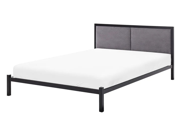 Bed with black metal frame and gray upholstered headboard on a white background