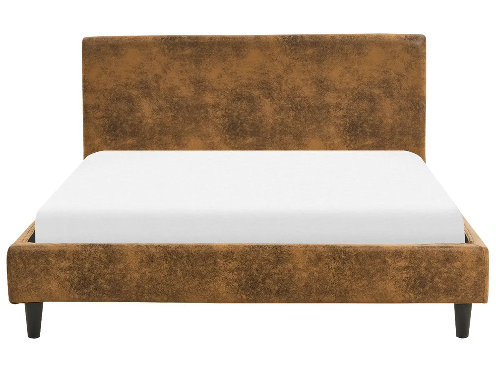 Brown upholstered bed frame with white mattress on a white background