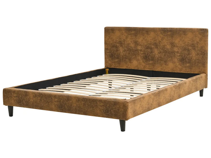 Brown upholstered bed frame on a white background