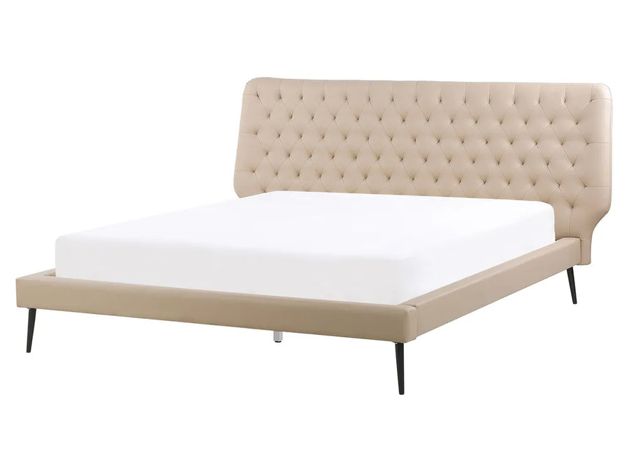 Beige upholstered bed with white mattress on a white background