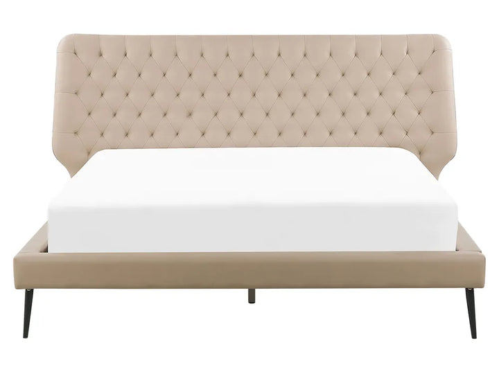 Beige upholstered bed with tufted headboard on a white background