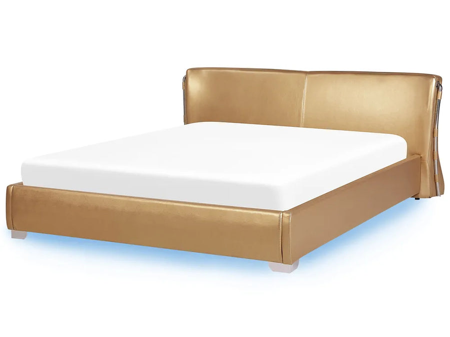 Gold bed frame with white mattress on a white background