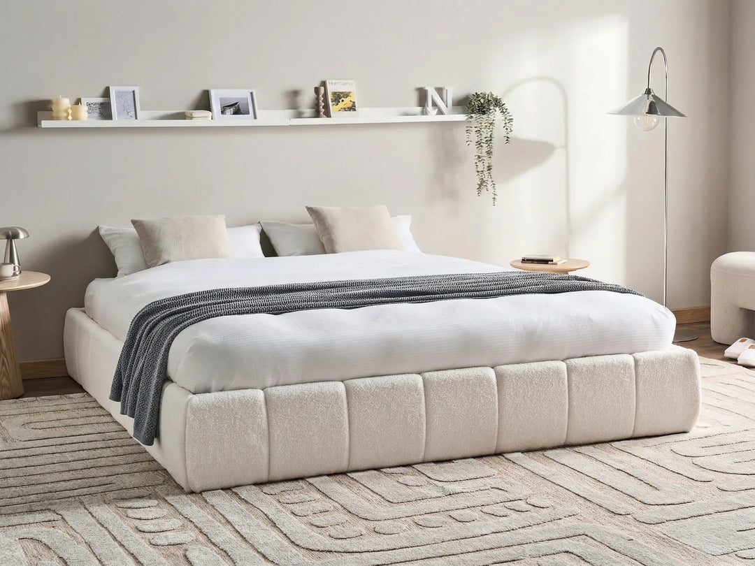 Low-profile boucle bed frame