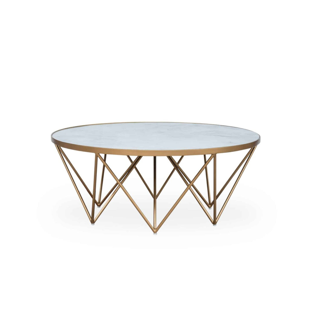 Round coffee table with marble top and gold geometric base on a white background
