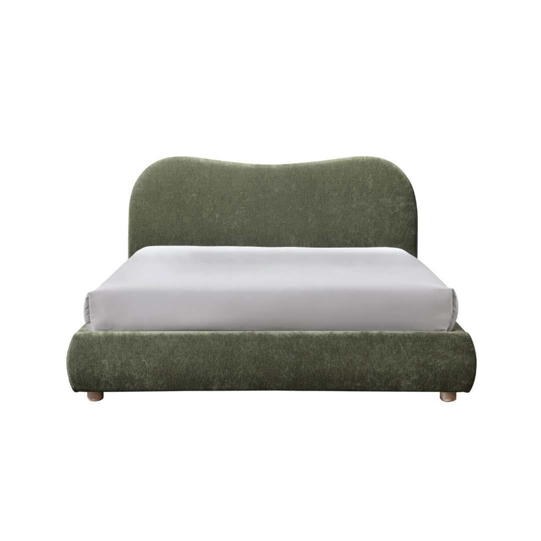 Green upholstered bed with a white mattress on a white background