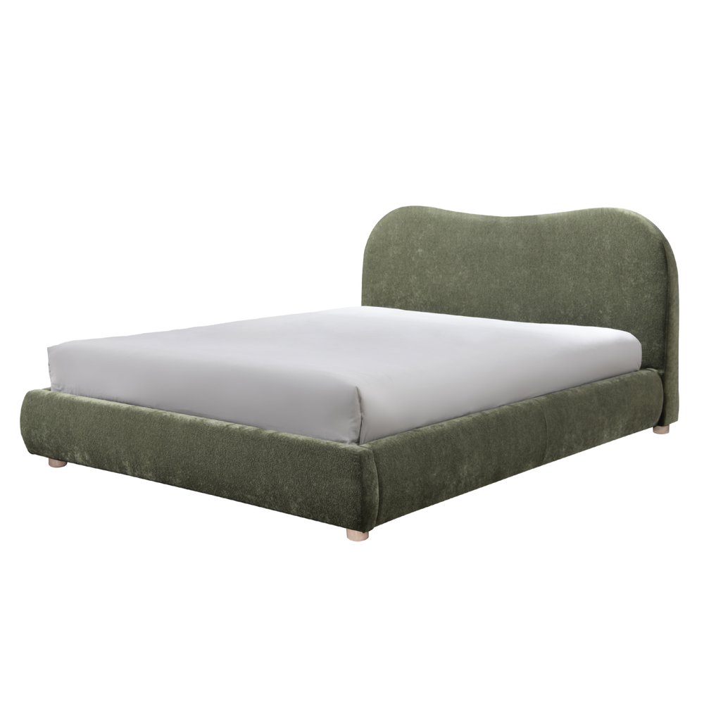 Green upholstered bed with white mattress on a white background