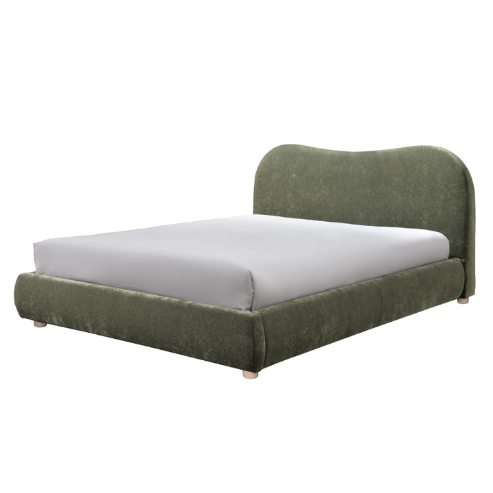 Green upholstered bed with white mattress on a white background