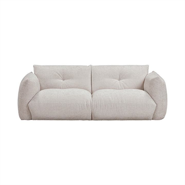 Beige sofa on a white background
