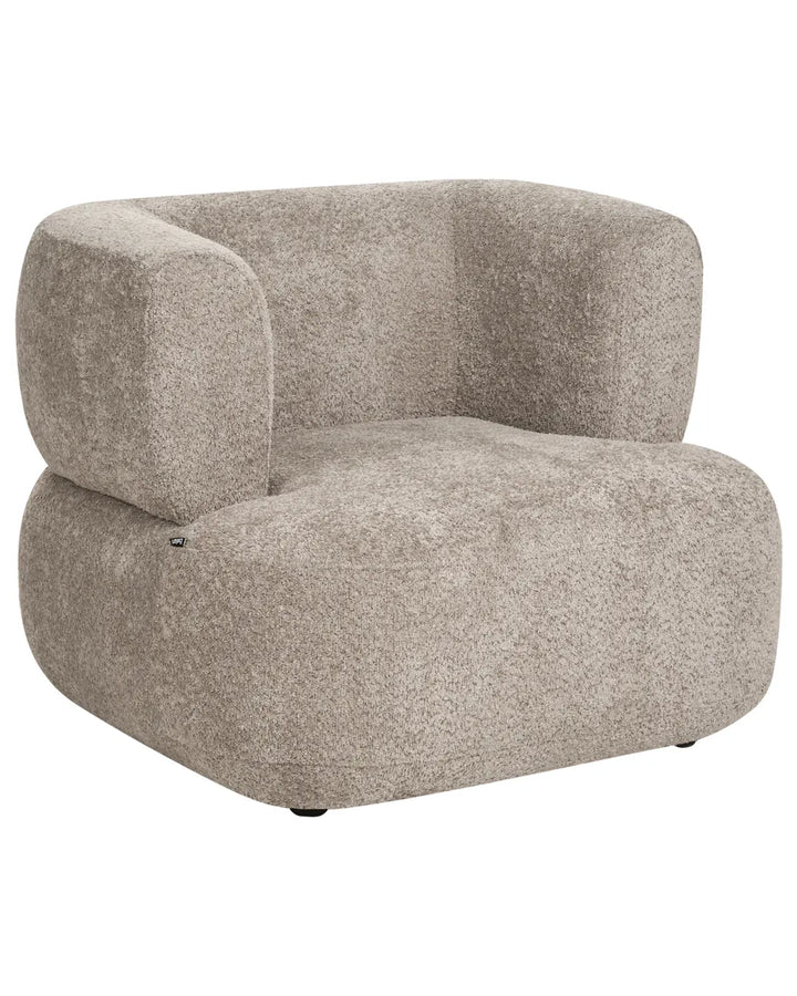 A modern low-profile armchair upholstered in a textured, heathered taupe-beige fabric, shown against a plain white background.