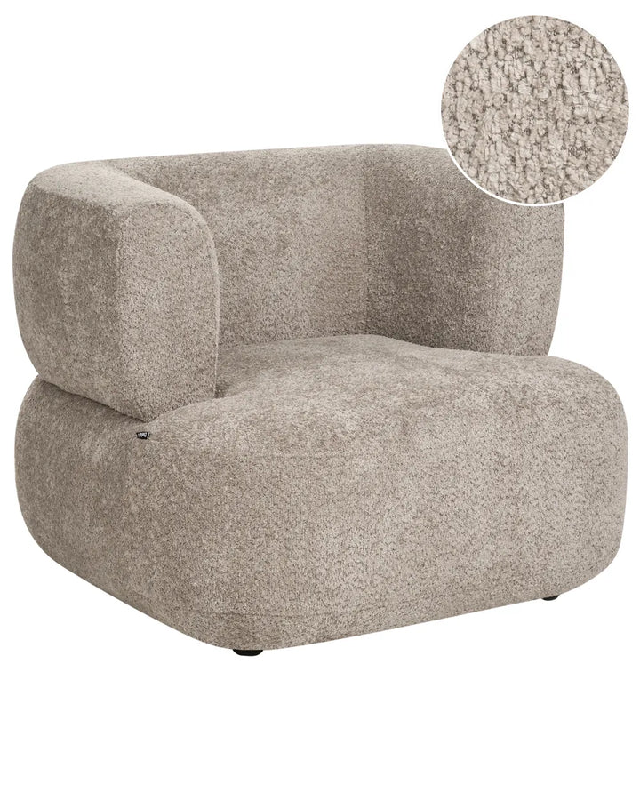 A modern low-profile armchair upholstered in a textured boucle fabric in a warm taupe-beige color, featuring a circular fabric close-up inset in the top right corner.