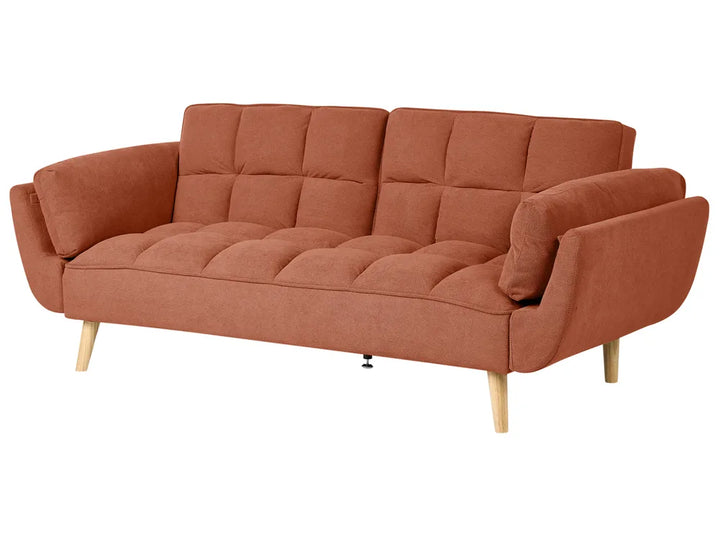 A mid-century modern two-seater sofa upholstered in terracotta rust fabric, featuring a tufted backrest and seat, chunky armrests, and light natural wood legs, shown against a plain white background.