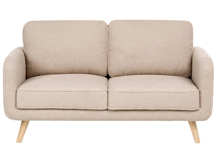 A two-seater loveseat sofa upholstered in a textured beige bouclé fabric, featuring light natural wood legs, shown against a plain white background.