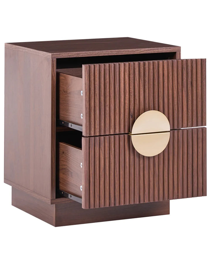 A modern two-drawer nightstand in dark brown wood with a fluted front design and a round gold metal pull handle, shown with one drawer open on a white background.