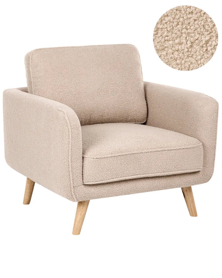 A beige bouclé armchair with light wood legs, shown on a white background with a circular fabric texture inset in the top right.