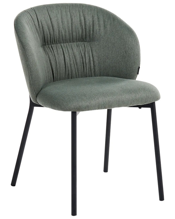 A modern dining chair with a textured sage green upholstered seat and curved backrest featuring vertical channel tufting, supported by slim black metal legs, shown against a plain white background.
