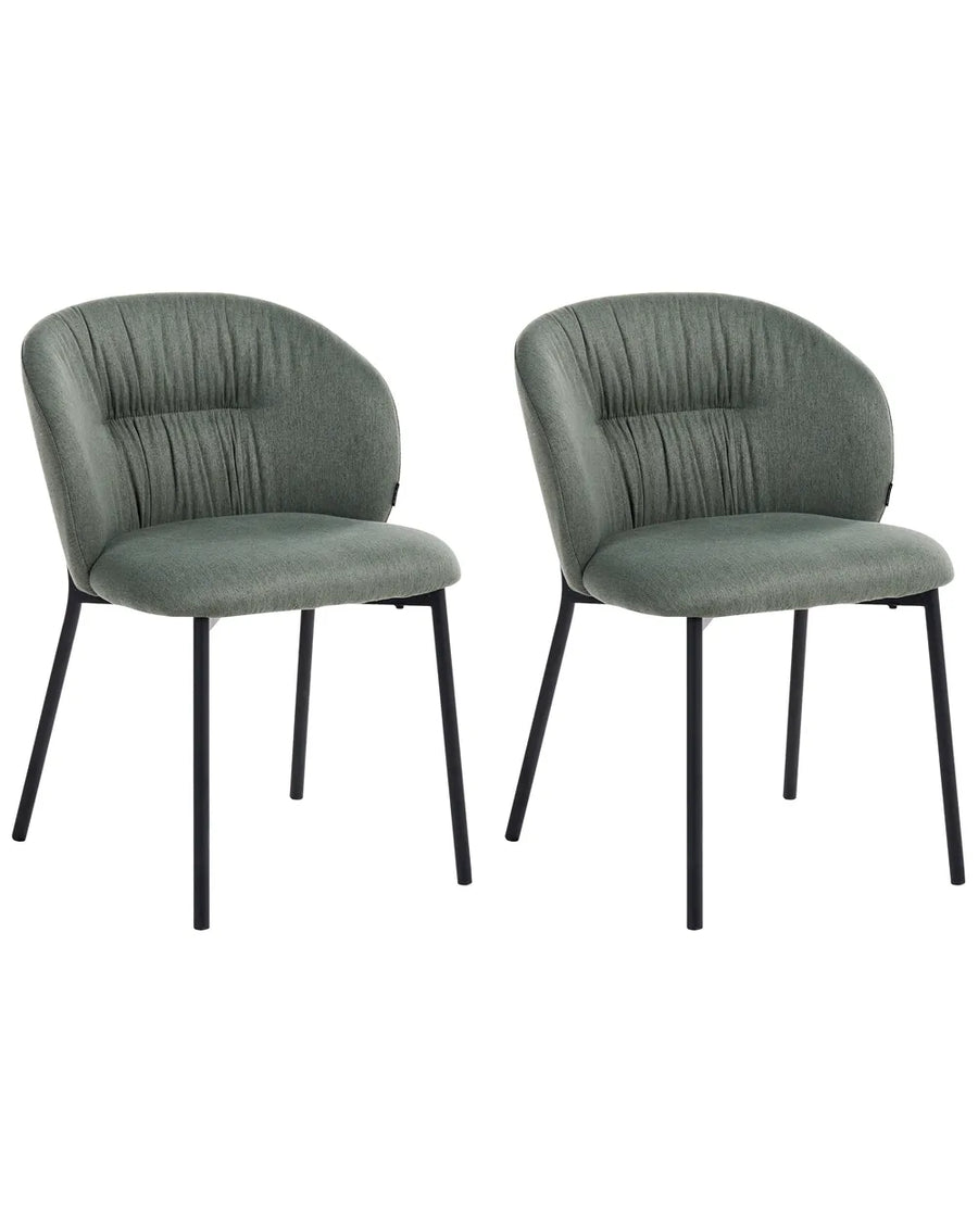 Two matching upholstered dining chairs with rounded backs, channel-tufted vertical stitching, and black metal legs, shown on a plain white background.