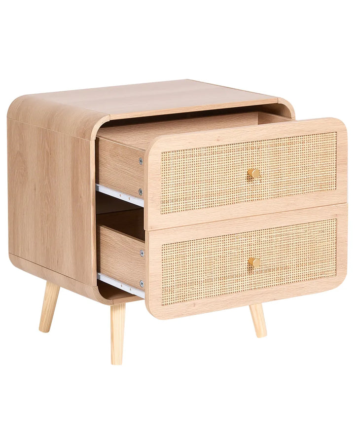A mid-century modern wooden nightstand with two drawers featuring woven cane fronts and light wood legs, shown on a white background.