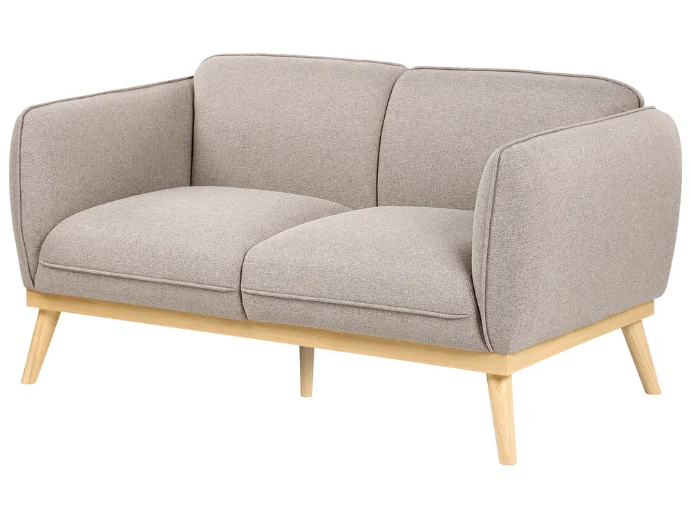 A modern two-seater sofa with light beige textured fabric upholstery and a natural light wood frame with tapered legs, shown on a plain white background.