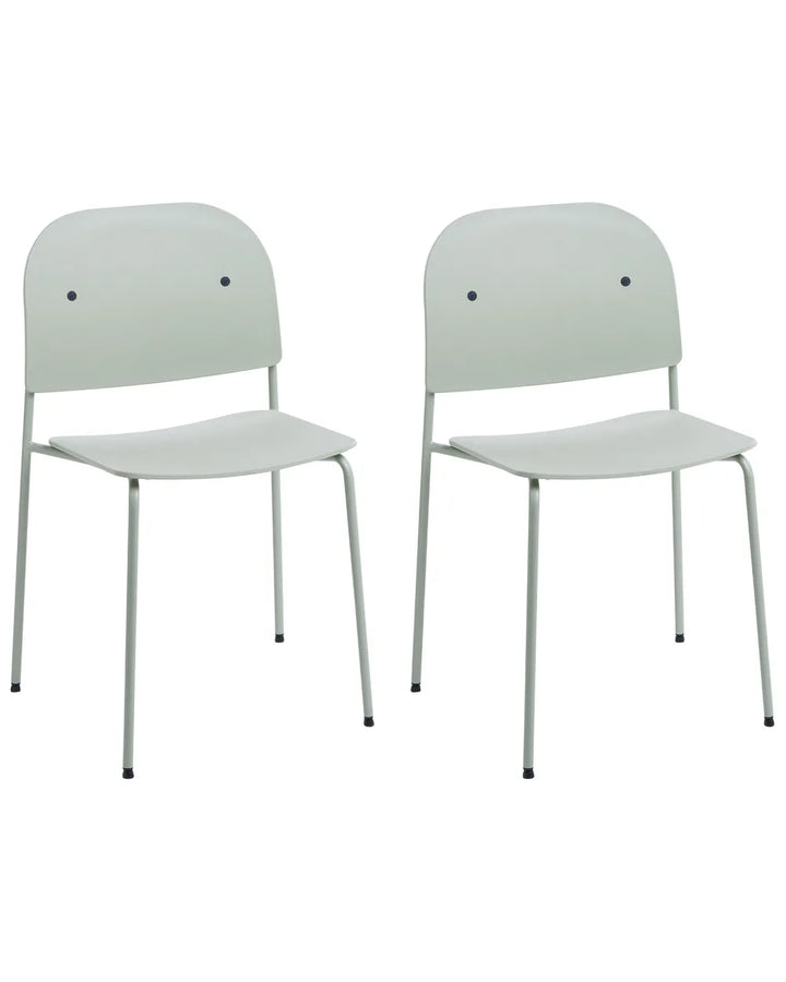 Two modern white plastic dining chairs with slim metal legs, shown side by side against a plain white background.