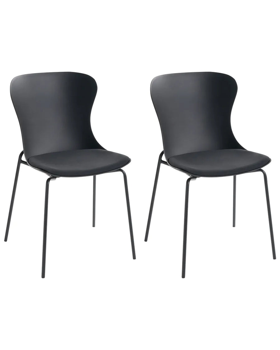 Two modern black dining chairs with curved backs and slim metal legs, shown side by side on a plain white background.