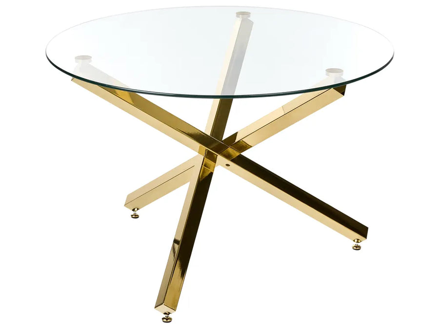 A round glass-top table with a polished gold metallic X-shaped base, shown on a plain white background.