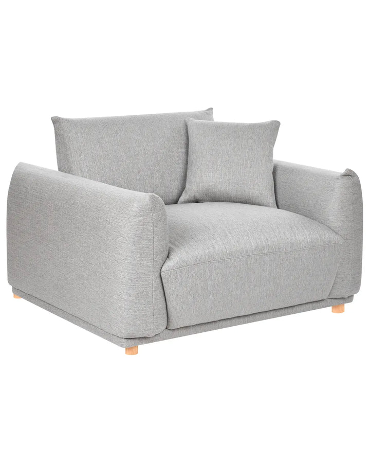 A modern light gray upholstered armchair with two matching back cushions and small wooden legs, shown on a plain white background.