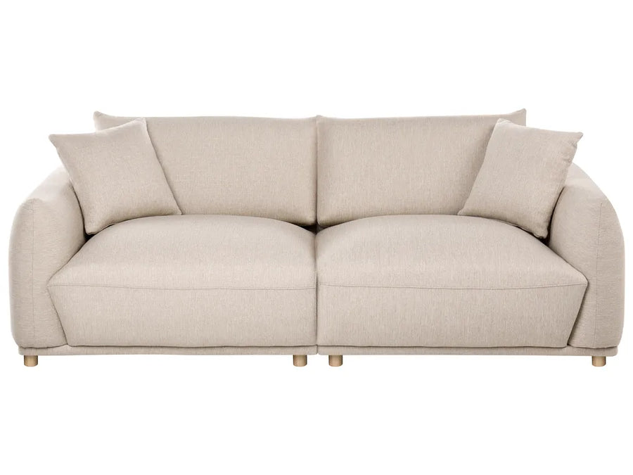 A modern two-seater sofa upholstered in a light beige textured fabric, featuring two matching throw pillows and small wooden legs, shown against a plain white background.