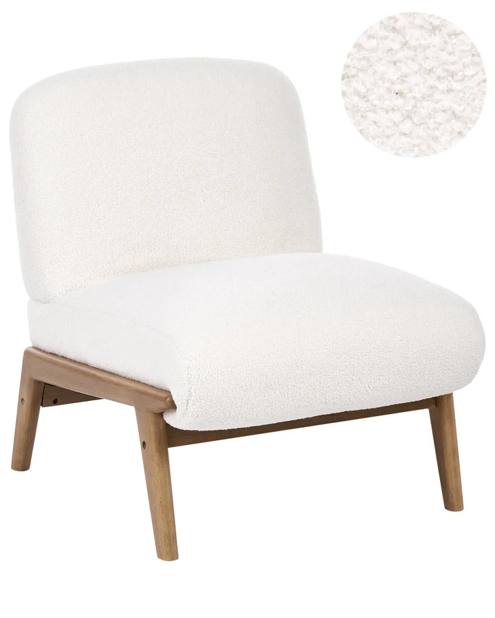 A modern accent chair with a textured off-white bouclé upholstered seat and backrest, supported by a light natural wood frame with tapered legs. A circular inset in the top right shows a close-up of the bouclé fabric texture.