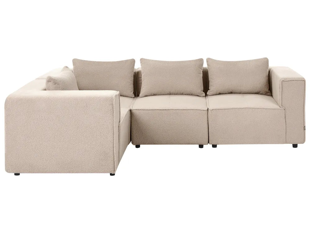 A modern L-shaped sectional sofa upholstered in a light beige textured fabric, featuring three matching back cushions and a left-facing chaise lounge, shown against a plain white background.