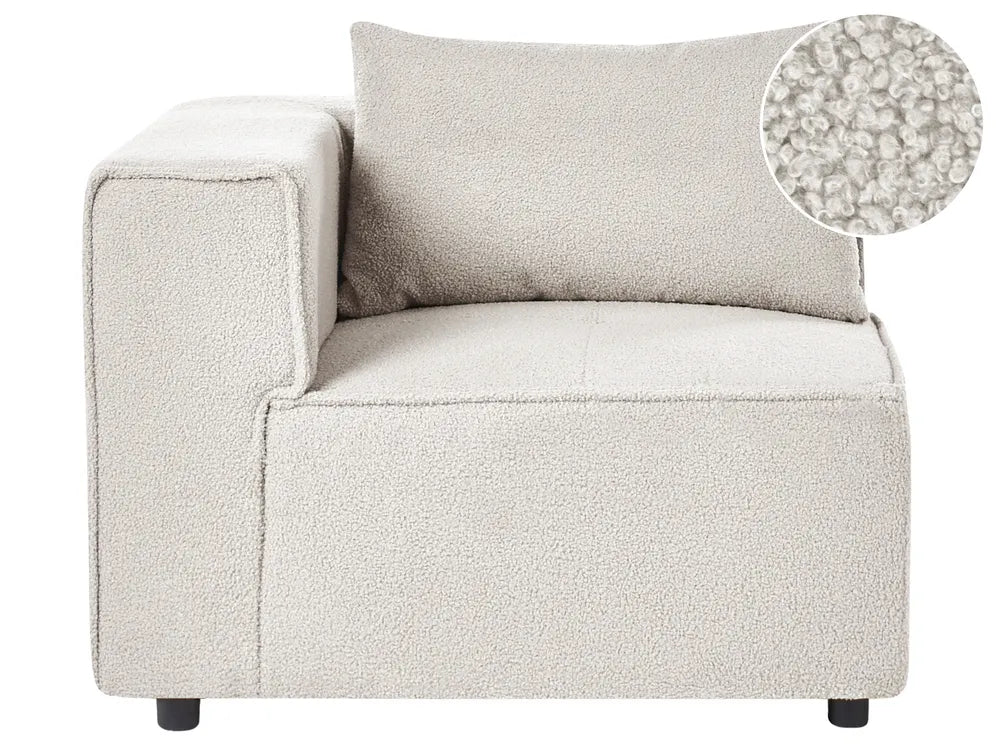 A light beige bouclé armchair with a matching back cushion, shown on a white background with a circular fabric texture inset in the top right.