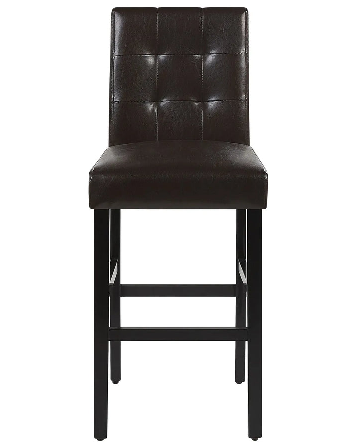 A dark brown faux leather barstool with a tufted backrest and a black metal frame with four legs and a footrest.