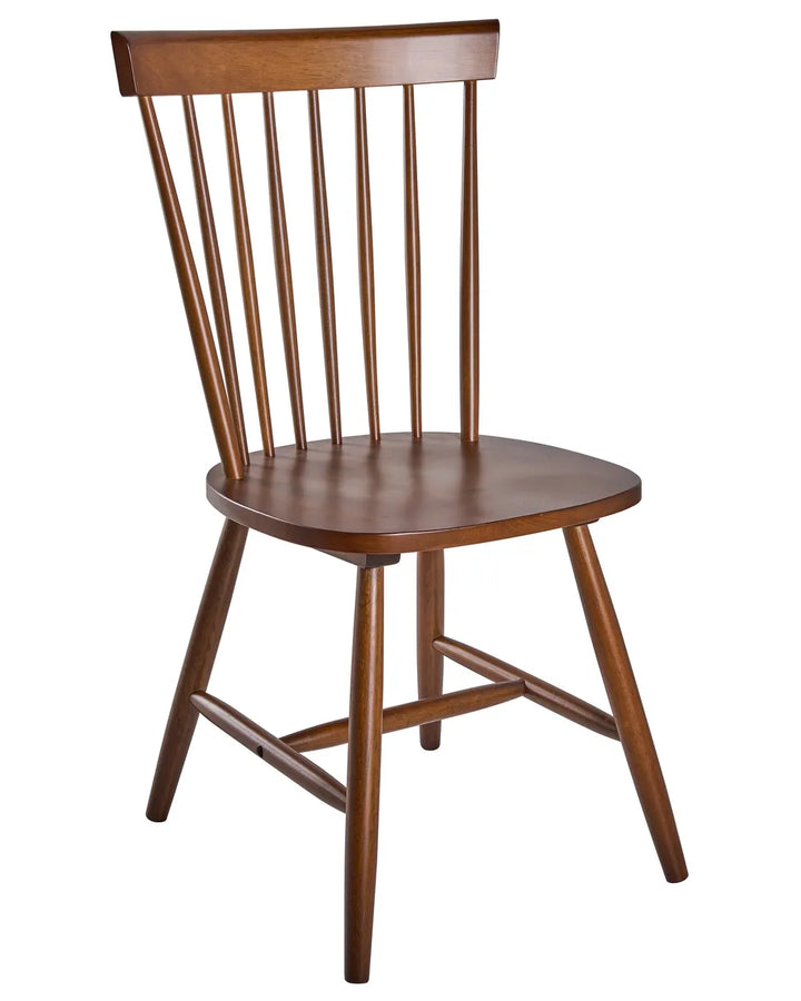 A wooden dining chair with a spindle back, round seat, and angled legs, shown against a plain white background.